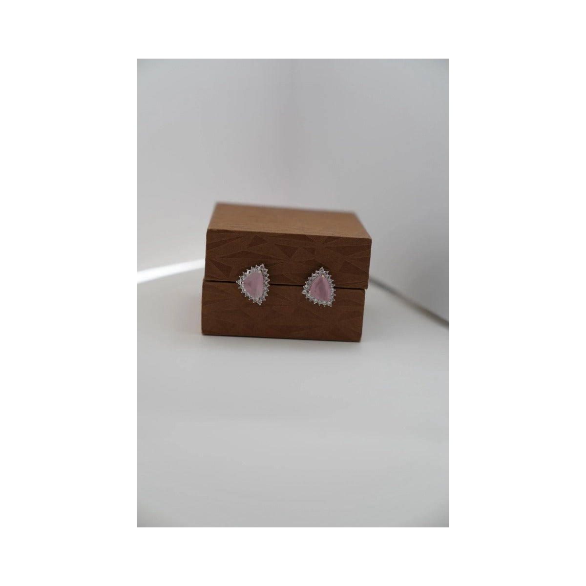 blush teardrop studs luxury